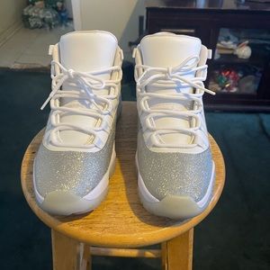 Woman’s Air Jordan Retro 11 Vast Grey 10.5 and size 9 in Men